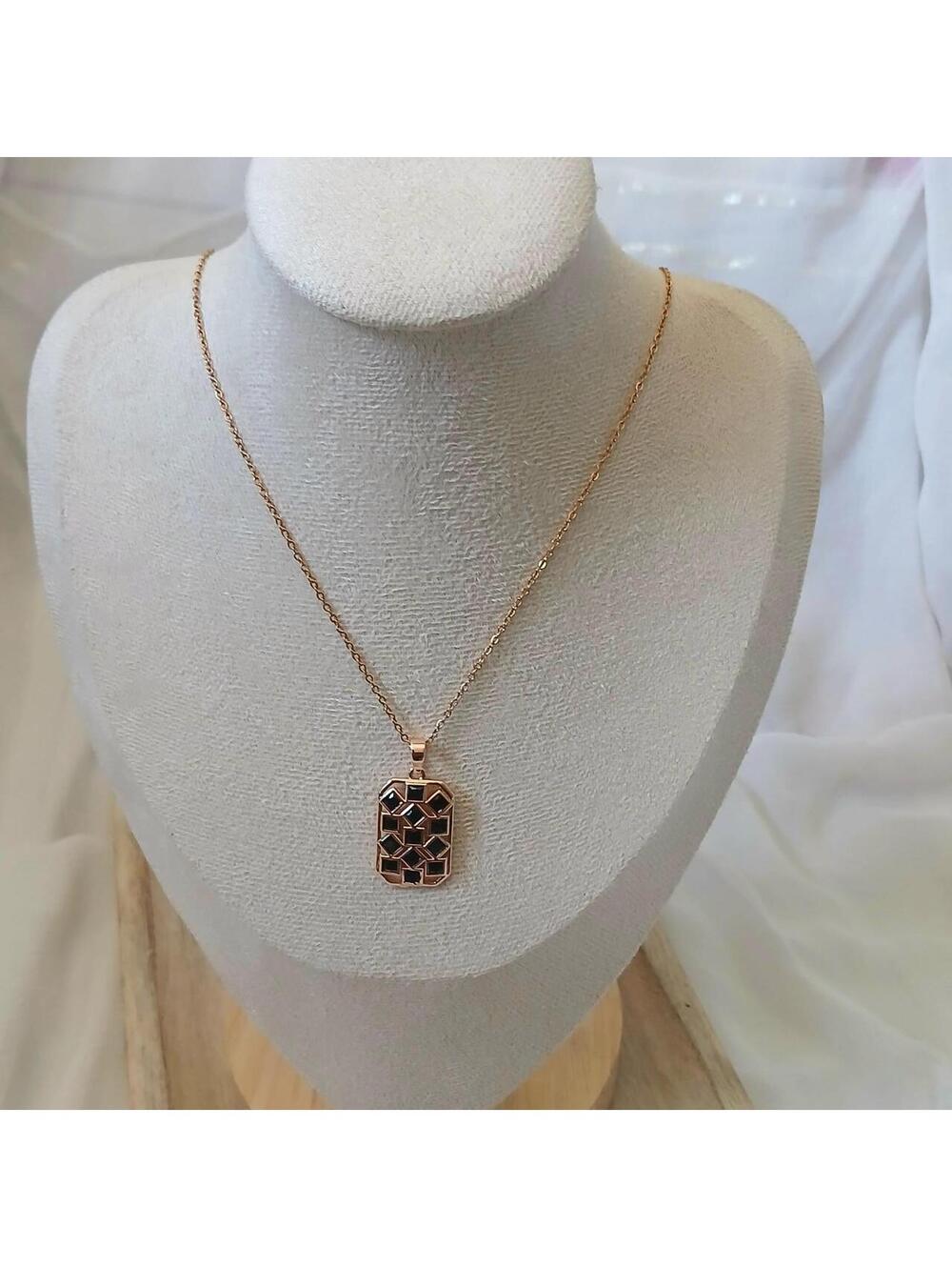 Black & gold geometric pendant necklace #geometric #statement